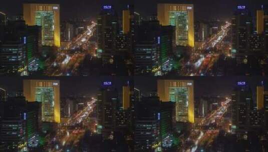 夜晚繁忙的道路和北京的建筑高清在线视频素材下载