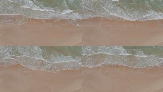航拍海滩上的海浪高清在线视频素材下载
