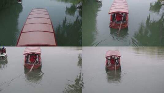 扬州瘦西湖阴雨天在雨中行驶的摇橹船及船娘高清在线视频素材下载