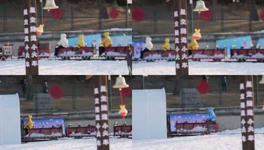 4K升格实拍冬季在冰雪乐园玩小火车的孩子高清在线视频素材下载