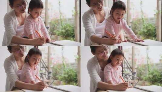 小女孩和妈妈在一起学习写字亲子时光高清在线视频素材下载