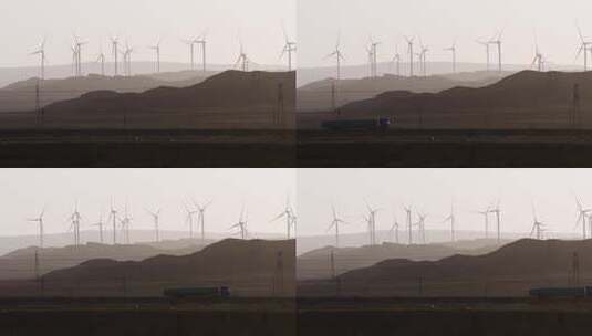 青海戈壁滩风力发电大风车和大货车高清在线视频素材下载
