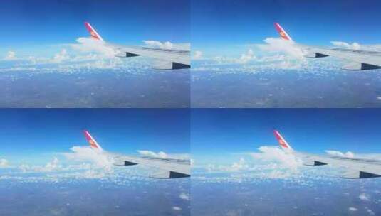 飞机飞行过程中窗外飞跃海南岛与山脉风景高清在线视频素材下载