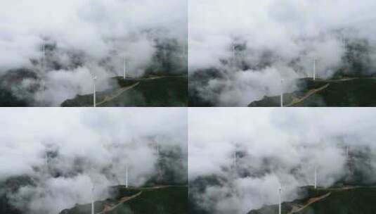 航拍穿云海清洁能源风力发电风车高清在线视频素材下载