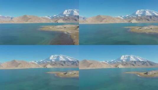 新疆青色湖中陆地航拍高清在线视频素材下载