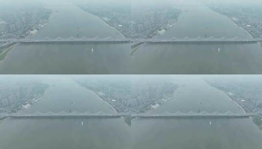 南昌朝阳大桥航拍赣江两岸阴天城市建筑风景高清在线视频素材下载