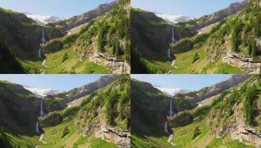 航拍夏天绿色山谷瀑布雪山空镜高清在线视频素材下载