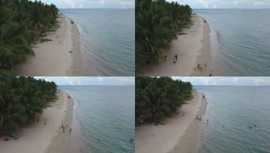 游客在海滩上玩耍高清在线视频素材下载