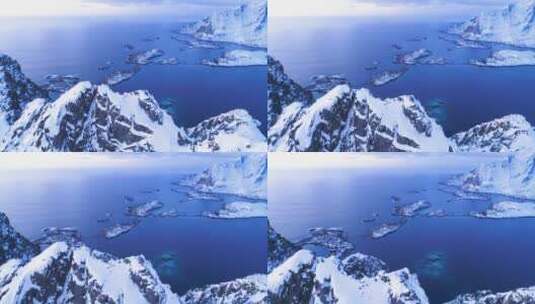 挪威罗弗敦群岛上白雪覆盖的山脉和桥梁高清在线视频素材下载