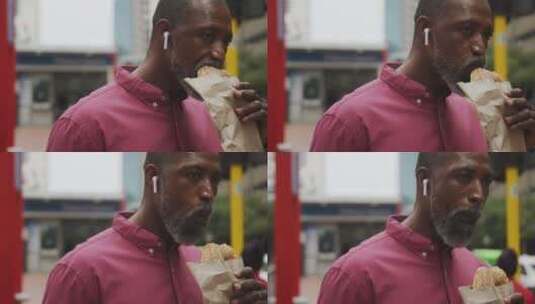 非裔美国人在街上吃饭高清在线视频素材下载