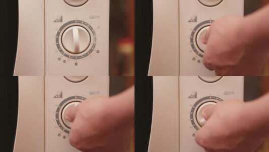 使用厨房电器微波炉电烤箱高清在线视频素材下载