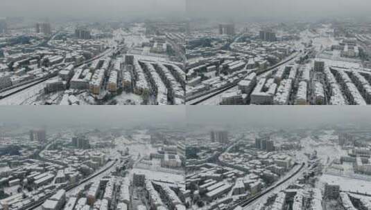 城市住宅小区冬天雪景航拍高清在线视频素材下载