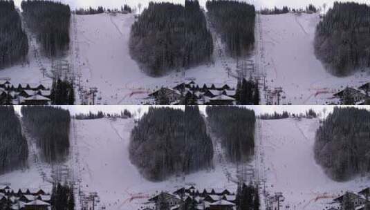 滑雪者在雪地中欣赏这座山高清在线视频素材下载