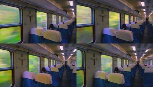 行驶火车车厢窗外自然风景与车内座椅景观高清在线视频素材下载