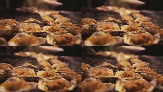 慢镜头升格拍摄宵夜美食小吃烧烤海鲜生蚝高清在线视频素材下载