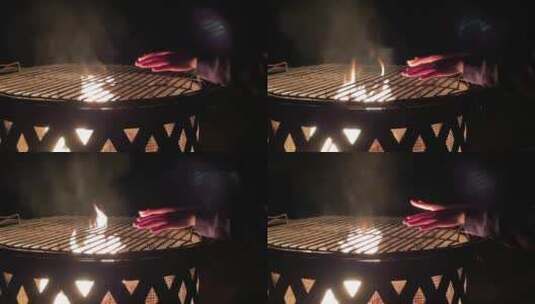 冬天夜晚户外野营烤火取暖高清在线视频素材下载