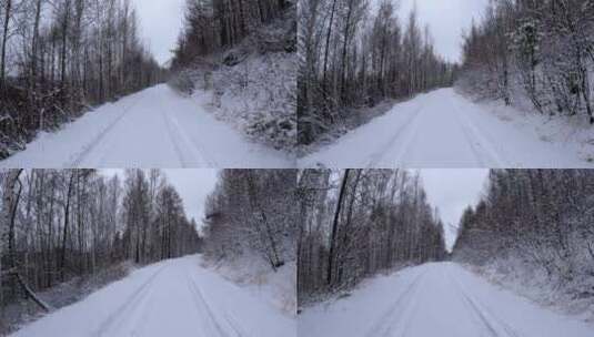 5K行驶在林海雪原的雪路上高清在线视频素材下载