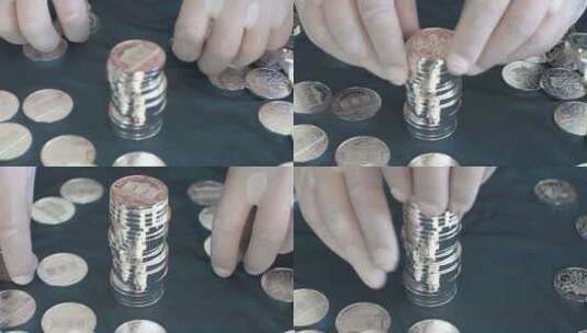 一个人堆叠银币高清在线视频素材下载