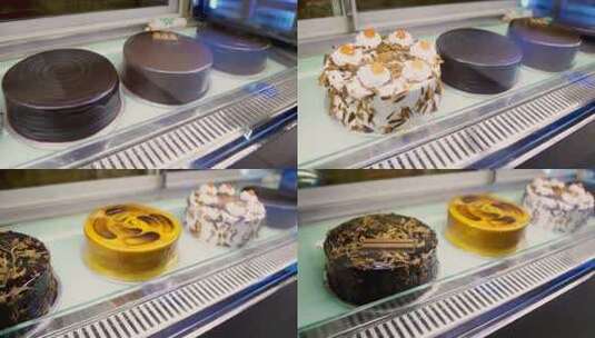 面包店橱窗上几种蛋糕的移动镜头高清在线视频素材下载