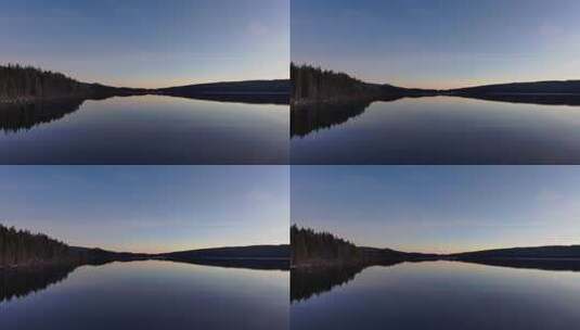 早晨平静反光的湖面高清在线视频素材下载