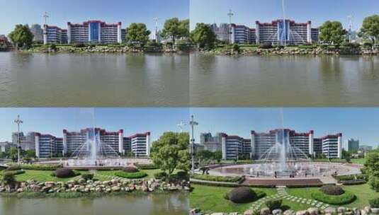 航拍鄂州市政府凤凰广场音乐喷泉表演高清在线视频素材下载