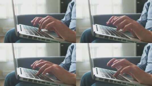 男人的手在电脑键盘上打字的特写高清在线视频素材下载