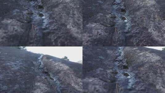 J浙江温州苍南碗窑石头表面的水流实拍视频1高清在线视频素材下载