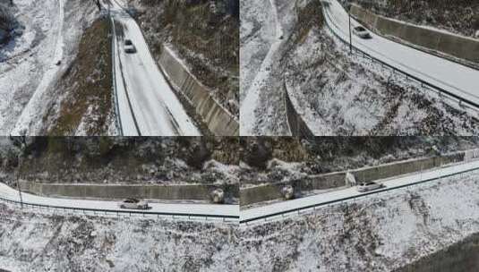 奔驰小轿车在雪地公路行驶旅行航拍雪景雾凇高清在线视频素材下载