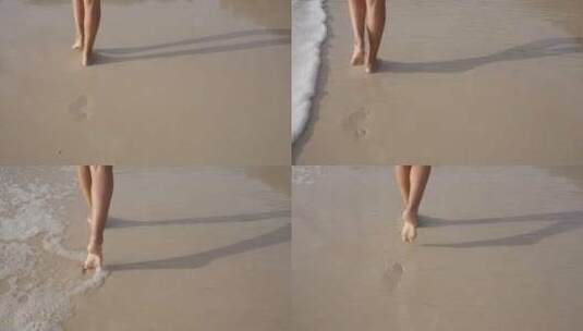 女生走在沙滩，流下脚印高清在线视频素材下载