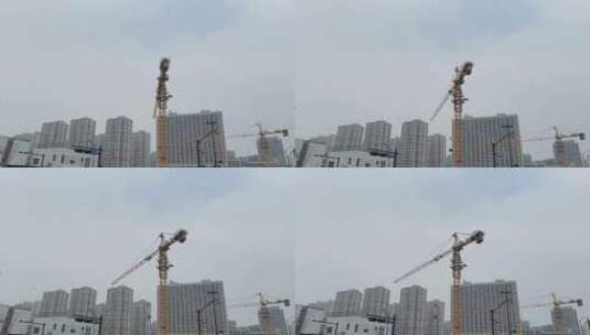 城市建设中大型塔吊机在施工高清在线视频素材下载