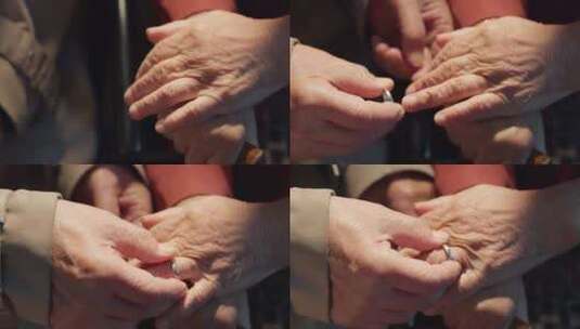 老人老年丈夫给妻子戴结婚戒指高清在线视频素材下载