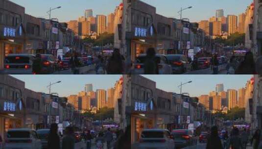 小镇黄昏街道人流车流脚步人群交通人口城市高清在线视频素材下载