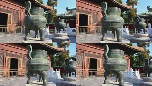 中国古代建筑前的铜炉铜鼎高清在线视频素材下载