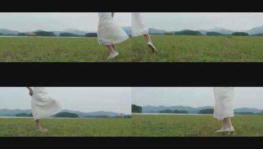 白色连衣裙女子在草原上旋转跳舞舞步特写高清在线视频素材下载