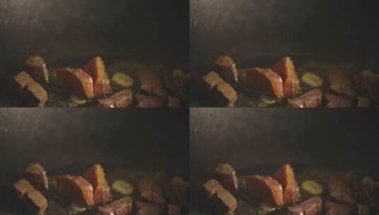 肉和大蒜被油炸高清在线视频素材下载