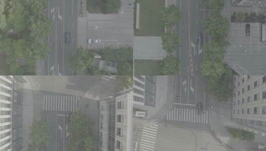 航拍城市现代建筑之间行驶的汽车高清在线视频素材下载