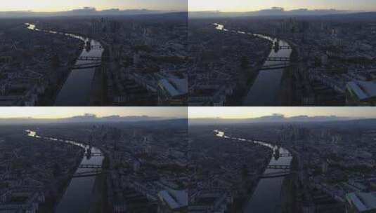 从空中俯瞰横跨城市的河流全景高清在线视频素材下载