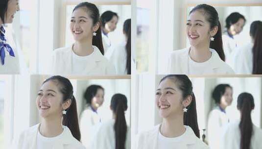 笑くポニーテールの女性高清在线视频素材下载