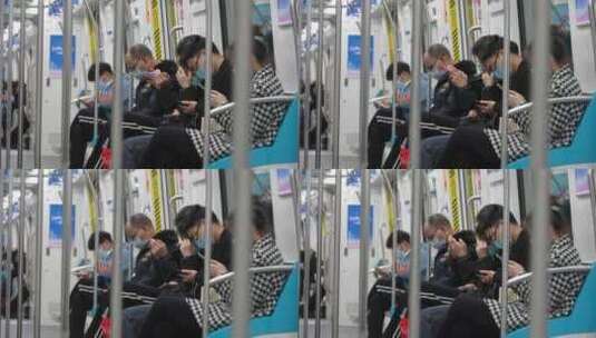 杭州地铁车厢内乘客使用手机高清在线视频素材下载