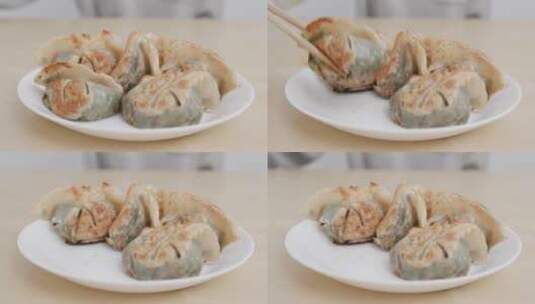 筷子炒饺子小笼蒸包煎包煎饺高清在线视频素材下载