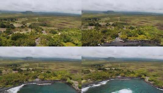 普纳卢的田园诗般的风景？夏威夷大岛上的黑沙滩-空中撤退高清在线视频素材下载