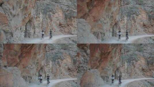 两人在山路骑自行车高清在线视频素材下载