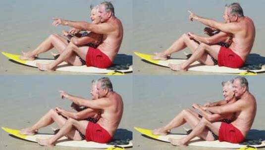 坐在沙滩上的老年夫妇高清在线视频素材下载