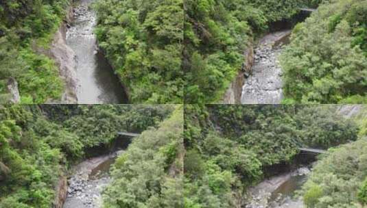 留尼汪岛马法特马戏团绿色峡谷中的一条河流的无人机镜头。高清在线视频素材下载