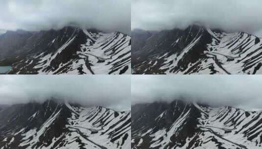 新疆独库公路哈希勒根达坂雪山航拍高清在线视频素材下载