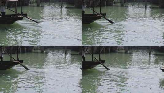 （慢镜头）乌镇小船河中前行船桨摇动特写高清在线视频素材下载