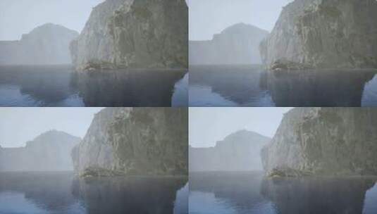 一块雄伟的岩石从平静的水中升起高清在线视频素材下载
