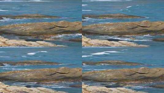 海岛早晨大海海浪浪花拍打礁石竖屏高清在线视频素材下载