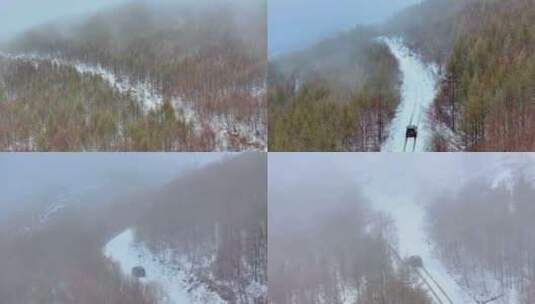 4k航拍车辆行驶在雪后的山林中高清在线视频素材下载