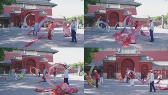 北京早晨舞彩带龙的老年人市民高清在线视频素材下载